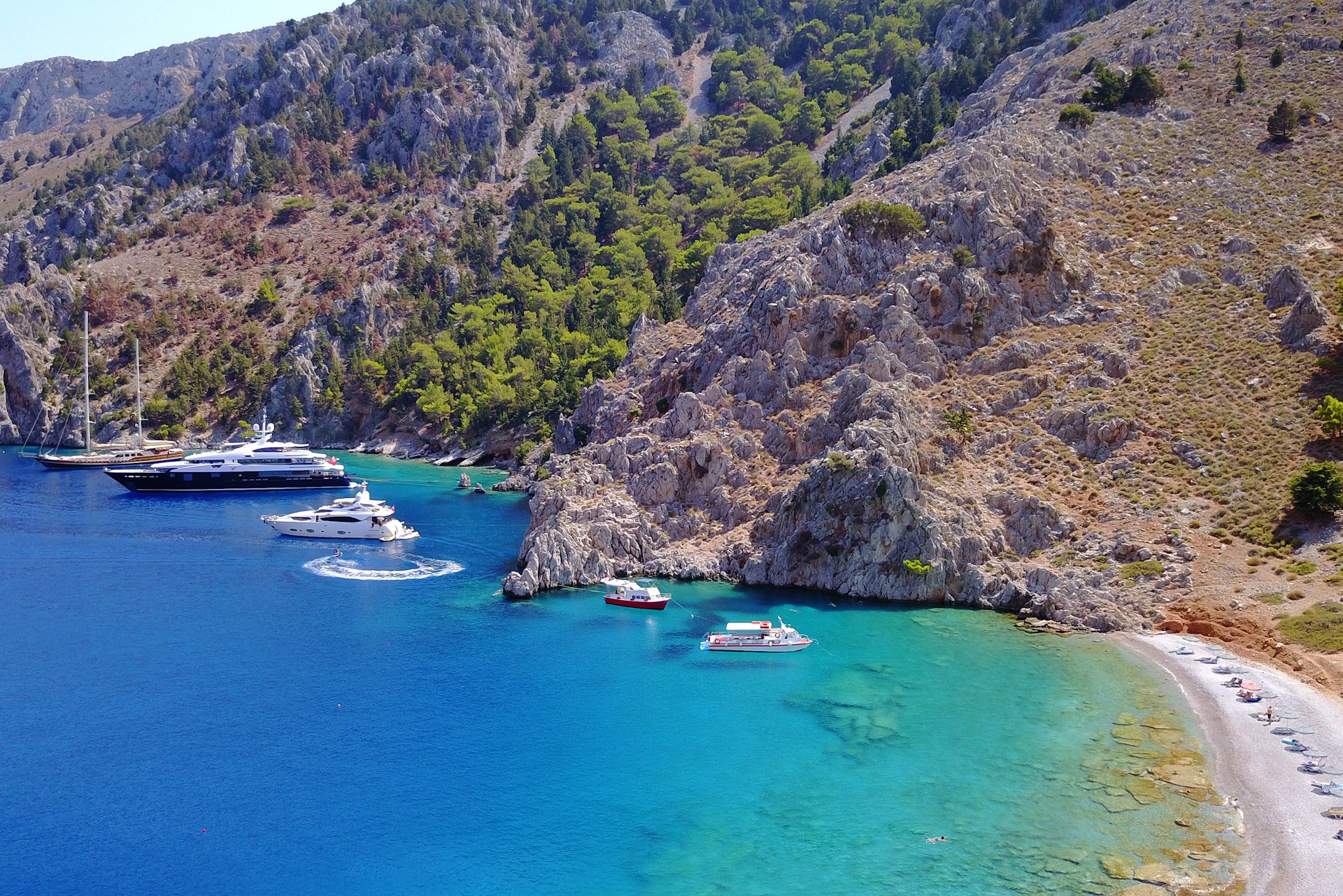 Aerial birds eye view photo taken by drone of famous tropical ro symi