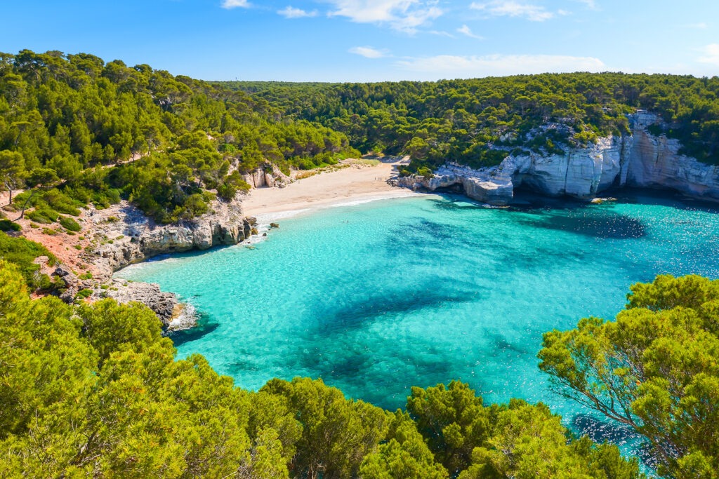 View of Mitjaneta beach with beautiful turquoise sea water, Menorca