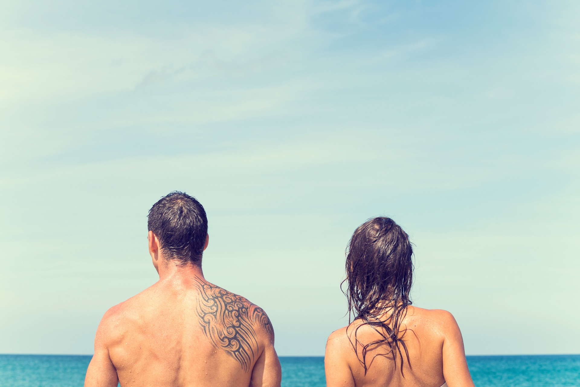 Young couple 1920x1280 sp Topless young woman covering her breasts by hands