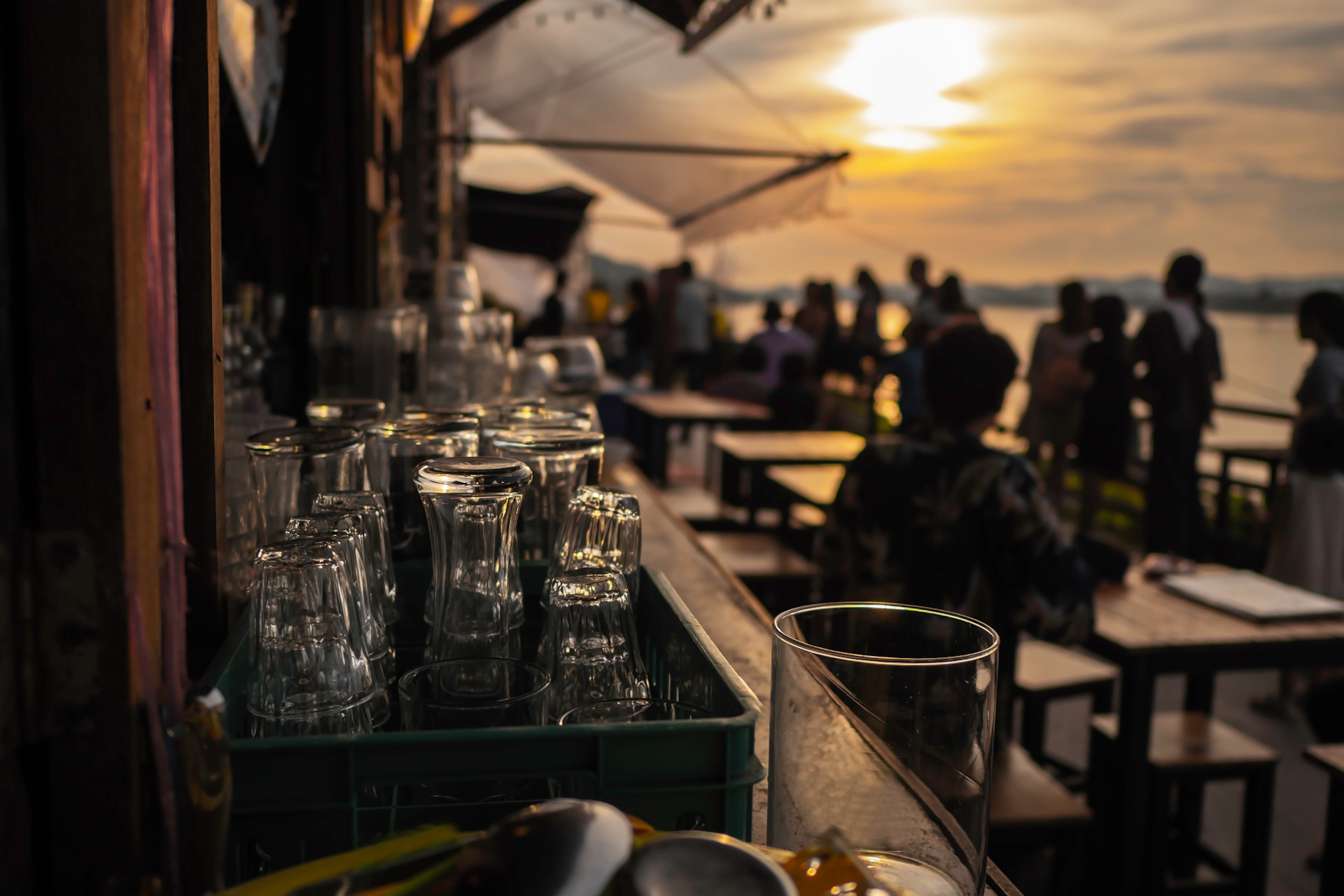 Empty glass At sunset, on the table with space for preparing for FKK-Lifestyle