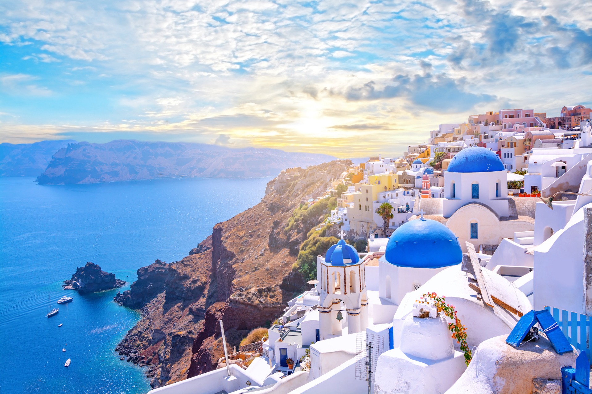 Beautiful Oia town on Santorini island, Greece. Traditional whit 1920 x1280 sp Topless young woman covering her breasts by hands