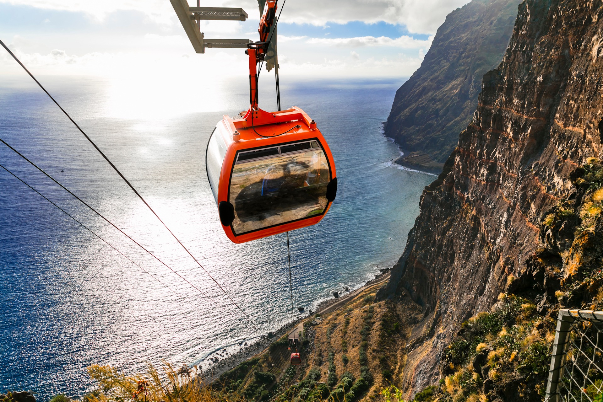 Cable car going down along the cliffs, Achadas da Cruz, Madeira