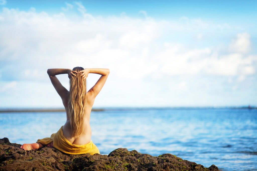 Beautiful body of woman while relaxing in Finnish sauna