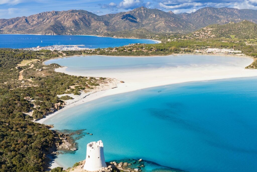 Aerial view of Porto Giunco beach and tower, Villasimius, Sardin Naturist Park Koversada bei Vrsar mit Meer, Inseln und FKK-Stränden
